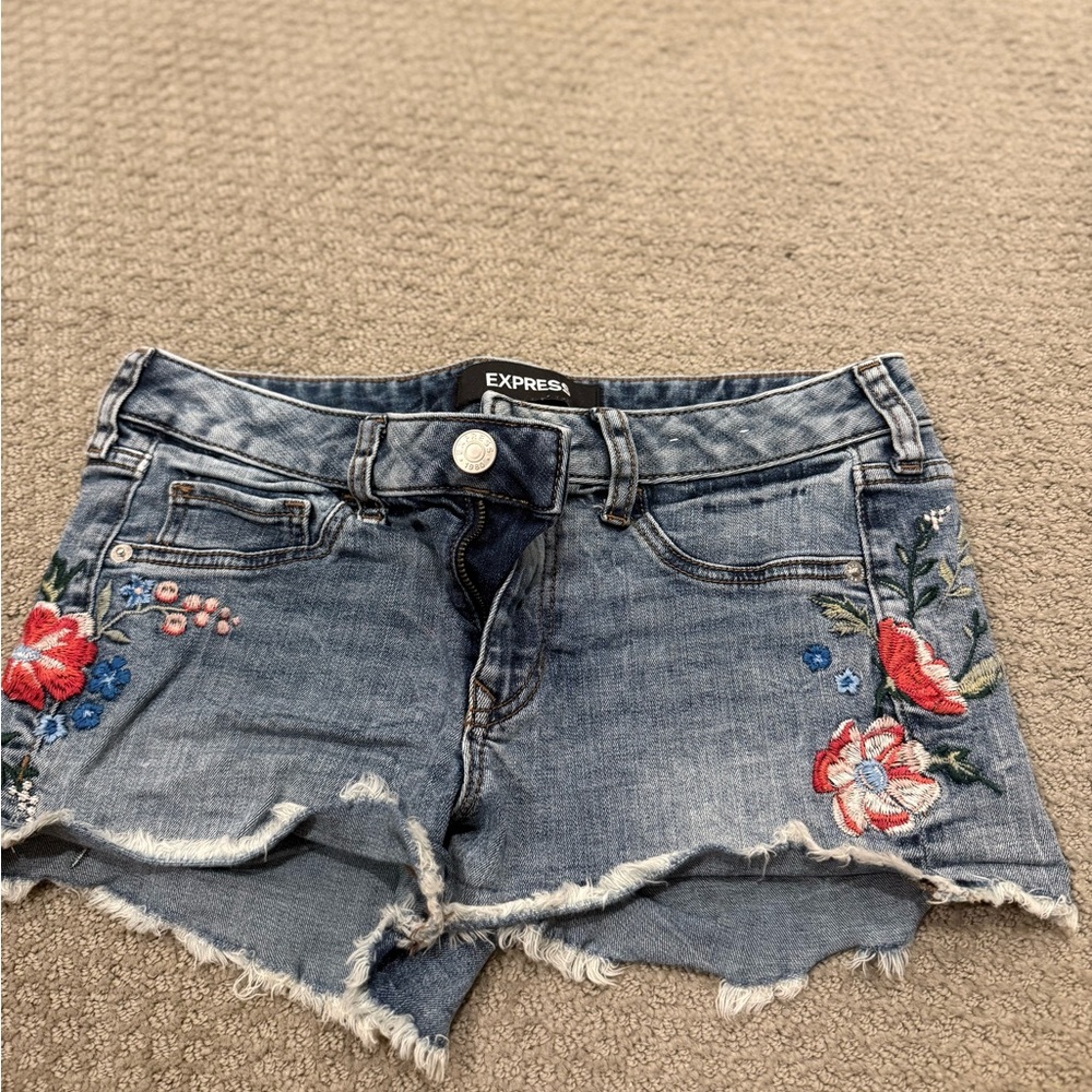 Express Women's Distressed Blue Jean Shorts with Floral Design